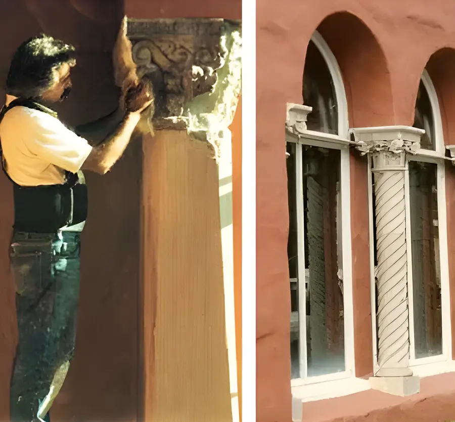 A man painting the outside of a building.